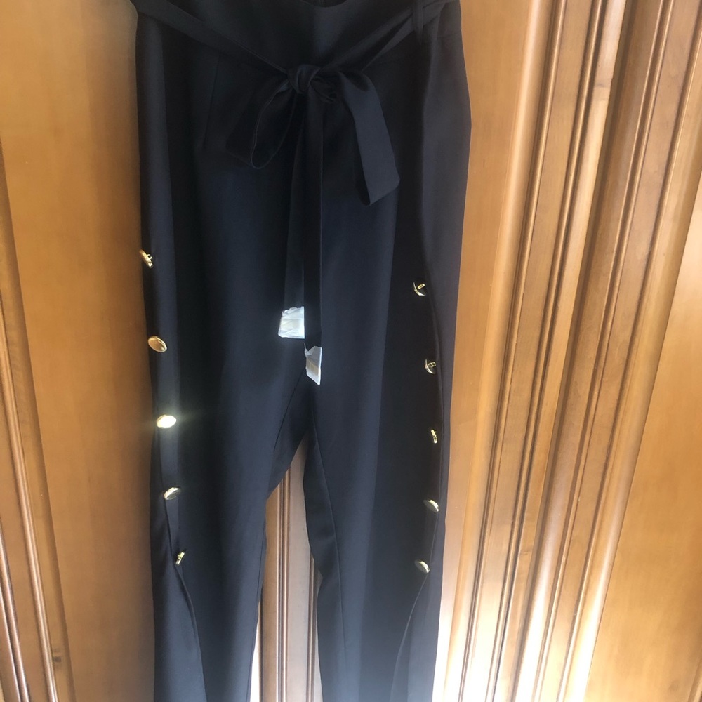 Brand new black pants with back zipper. Brand Venus. Size 14